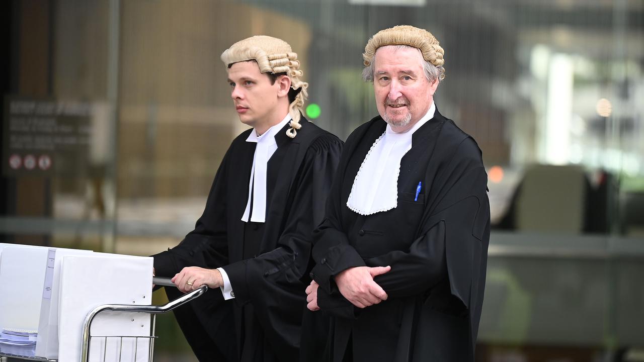 Plaintiff counsel Douglas Savage KC (right) leaving the Brisbane Supreme Court. Picture, John Gass