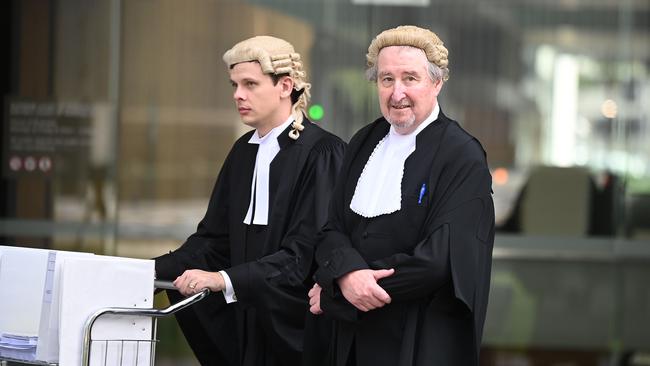Plaintiff counsel Douglas Savage KC (right) leaving the Brisbane Supreme Court. Picture, John Gass