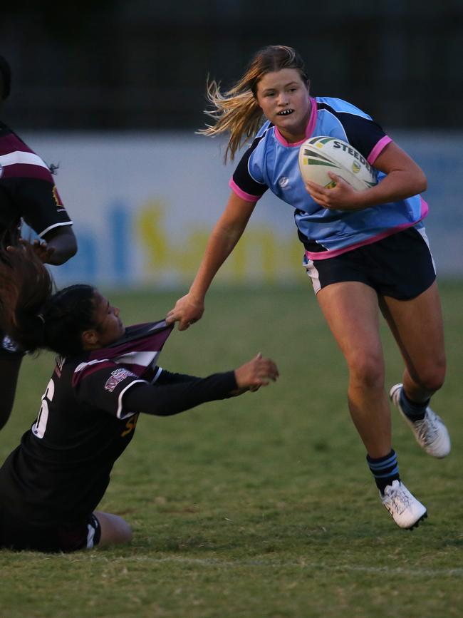 Titans Schools League at Burleigh Bears Junior Rugby League. Year 11/12 Division 1 girls Marymount v Marsden. Marymounts Lily Kolc brushes off the defence. Picture Glenn Hampson
