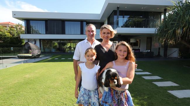 V8 Supercar driver Paul Weel and his wife Emma, with daughters Mila 8 and Abby 10, before selling their main river home at Carrara, which they built from scratch. Picture: Glenn Hampson