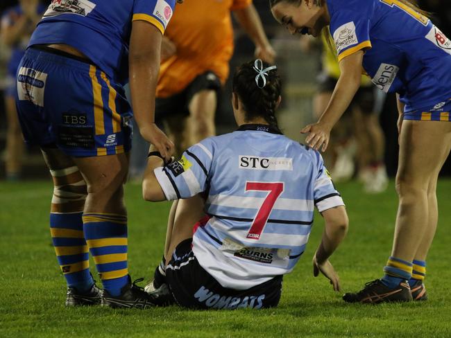 Sportsmanship was on show as Samantha McKechnie is given a hand. Picture Warren Gannon Photography