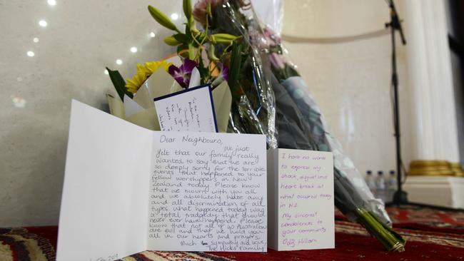 A message attached alongside flowers left at the Marion Mosque, showing support for the Muslim community. Picture: Brenton Edwards/AAP