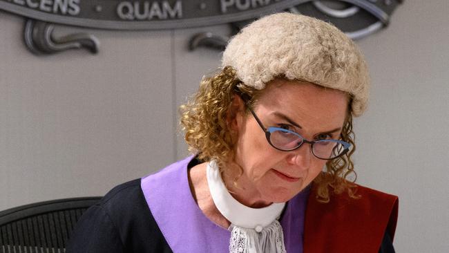 Judge Sarah Huggett delivers a verdict in the judge-alone trial of Chris Dawson at the Downing Centre District Court in Sydney. Picture: AAP