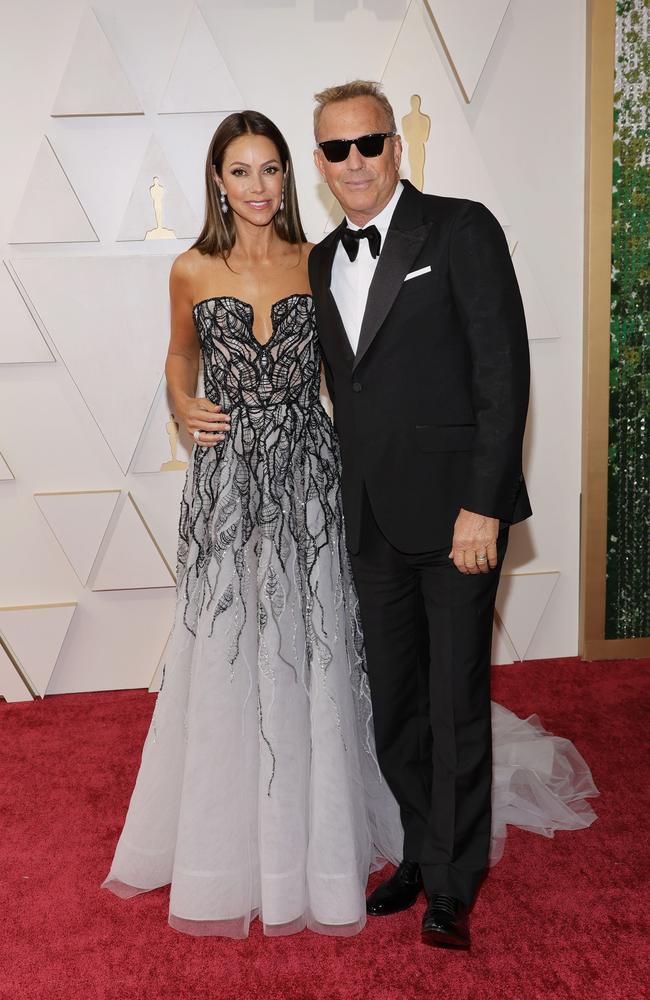 Christine Baumgartner and Kevin Costner attend the 94th Annual Academy Awards. Picture: Getty