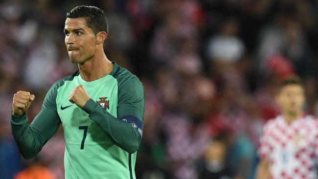 Portugal's forward Cristiano Ronaldo celebrates after winning