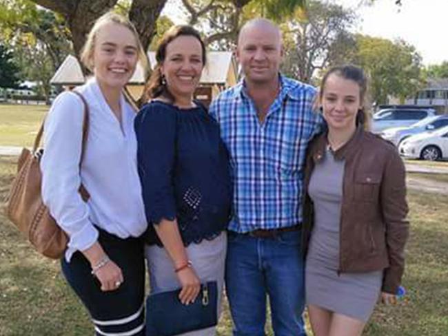 Dolly, on right, with her parents and older sister.