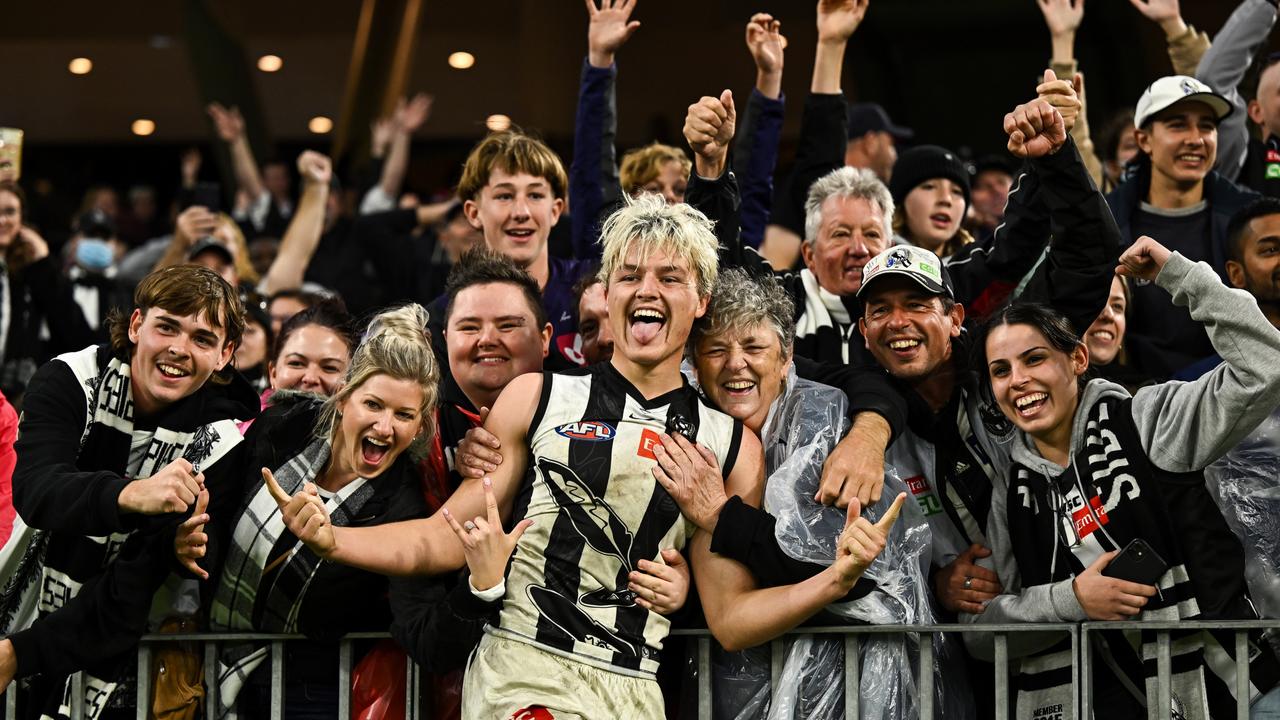 Jack Ginnivan celebrates Collingwood’s upset win with Pies fans. Picture: Daniel Carson/AFL Photos via Getty Images