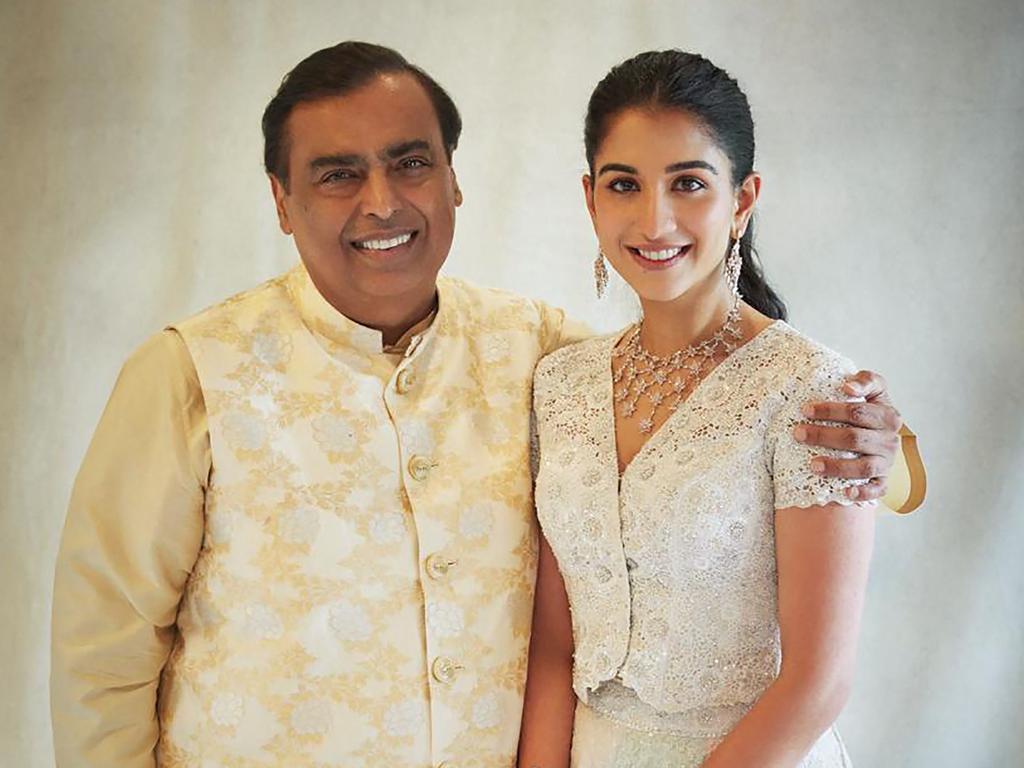 Billionaire tycoon Mukesh Ambani (L) with his to-be daughter-in-law Radhika Merchant. Picture: AFP photo/Reliance