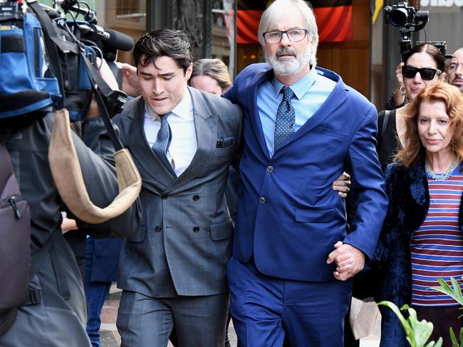 Australian actor John Jarratt leaving court with Bryan Wrench. Picture: AAP