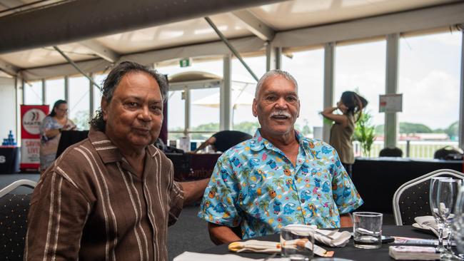 Norman Hagan and Benny Vigona celebrates as International Men's Day Lunch at the Darwin Turf Club Pavilion, Darwin. Picture: Pema Tamang Pakhrin