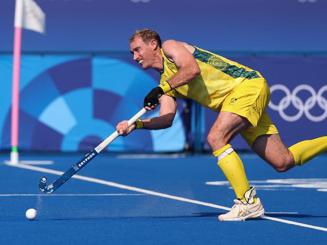 PARIS, FRANCE - JULY 29: Aran Zalewski of Team Australia passes the ball in a penalty corner during the Men's Pool B match between Ireland and Australia on day three of the Olympic Games Paris 2024 at Stade Yves Du Manoir on July 29, 2024 in Paris, France. (Photo by Lintao Zhang/Getty Images)