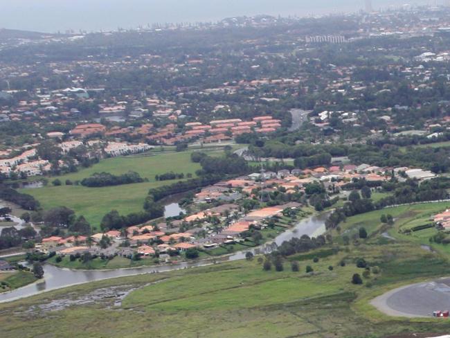 Aerial photos of Skilled Park and the Robina train station.