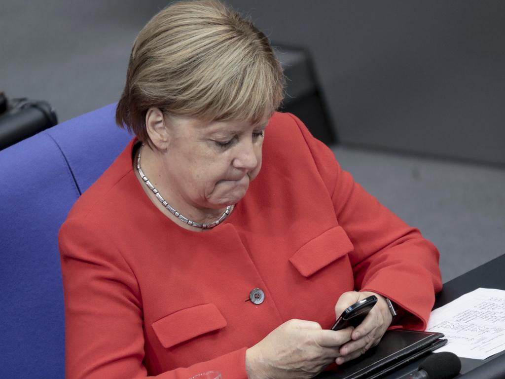 German Chancellor Angela Merkel has had private chats, financial and contact details published online in a hack attack. Picture: AP