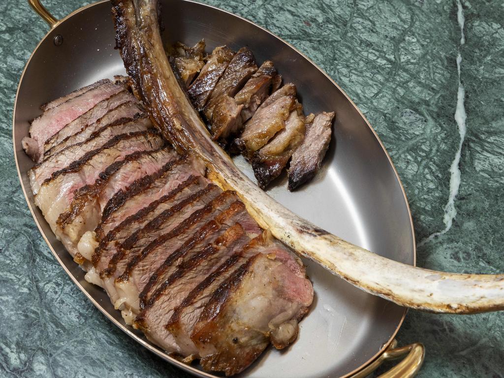 Dry aged tomahawk steak at Establishment 203 by Ben O'Donoghue. Picture: Richard Walker