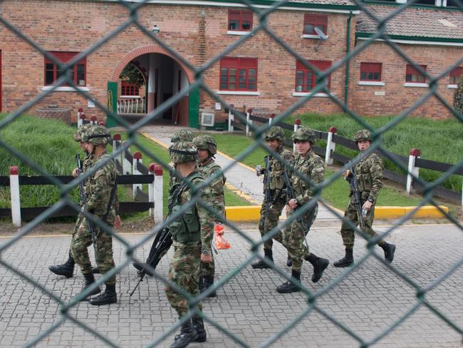 Soldiers patrol inside the jail. Picture: Joe Parkin Daniels