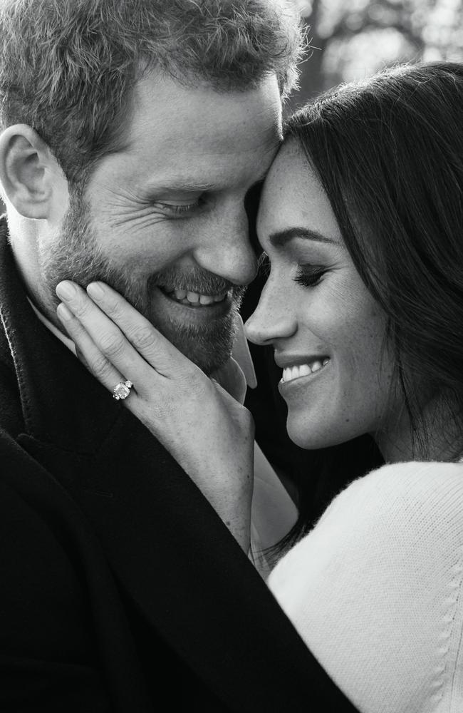 Prince Harry posing with his fiance US actress Meghan Markle at Frogmore House in Windsor in one of two official engagement photos. Picture: AFP