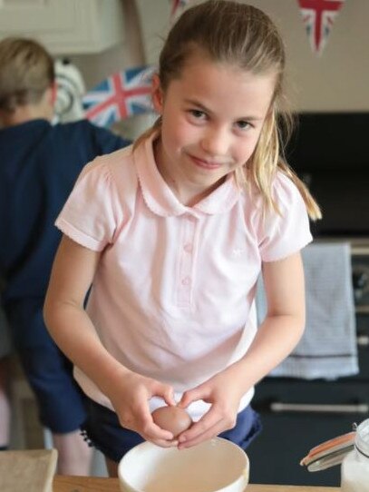 Princess Charlotte, 7, was on egg duty.