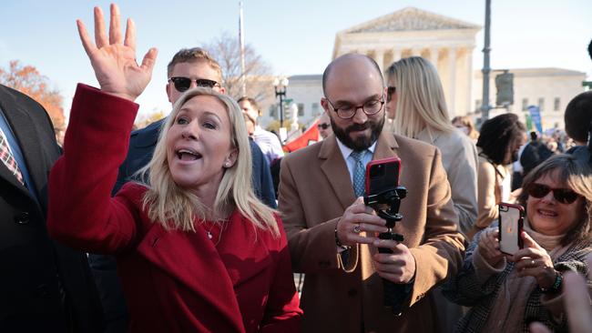 Republican representative Marjorie Taylor Greene joins fellow anti-abortion activists in front of the court. Picture: AFP