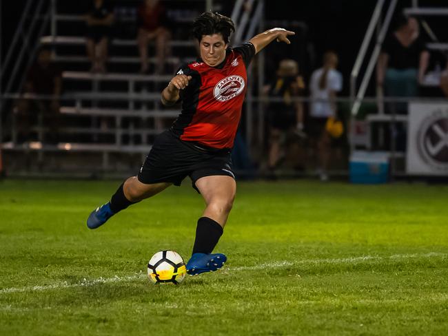 Leichhardt's Monique Ward kicks with power in Saturday nights Women's FNQ Premier League grand finals at Endeavour Park. Picture: Emily Barker