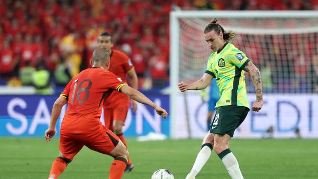 Socceroos midfielder Jackson Irvine (right) controls during Australia’s 2-0 win over China. Picture: Lintao Zhang/Getty Images