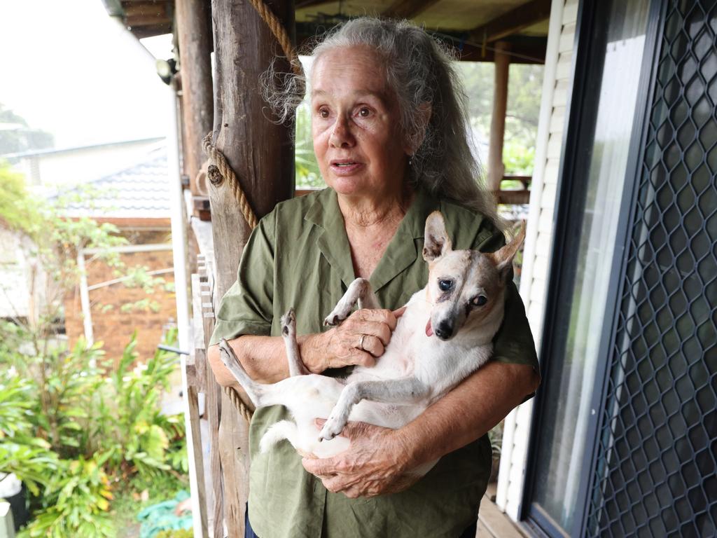 Rose Hand, with her dog, are worried about the damage Tropical Cyclone Alfred could bring. Picture: Matrix/ Nathan Smith