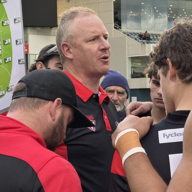 Lauderdale coach Brent Dolliver addresses his Bombers at Ninja Stadium. Picture James Bresnehan