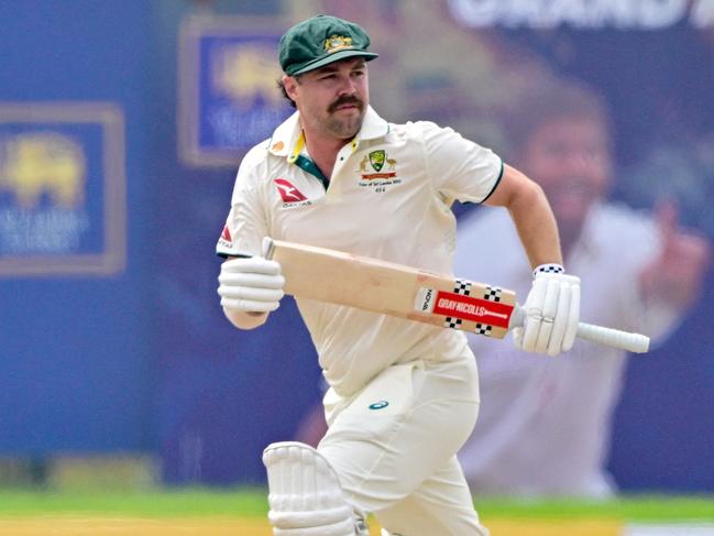 Australia's vice captain Travis Head run between the wickets during the first day of the first Test cricket match between Sri Lanka and Australia at the Galle International Cricket Stadium in Galle on January 29, 2025. (Photo by Ishara S. KODIKARA / AFP)