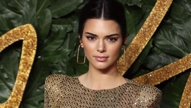 US model Kendall Jenner poses on the red carpet upon arrival to attend the British Fashion Awards 2018 in London on December 10, 2018. - The Fashion Awards are an annual celebration of creativity and innovation will shine a spotlight on exceptional individuals and influential businesses that have made significant contributions to the global fashion industry over the past twelve months. (Photo by Daniel LEAL-OLIVAS / AFP) / RESTRICTED TO EDITORIAL USE -  NO MARKETING NO ADVERTISING CAMPAIGNS