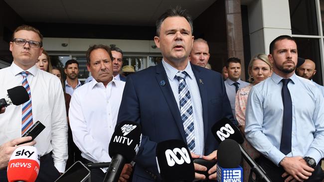 Police union boss Paul McCue addresses media outside court flanked by Const Rolfe and his legal team in March. Picture: (A)manda Parkinson