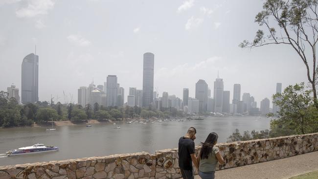 The skies over Brisbane and southeast Queensland have been choked by smoke haze from fires. Picture: AAP Image/Glenn Hunt