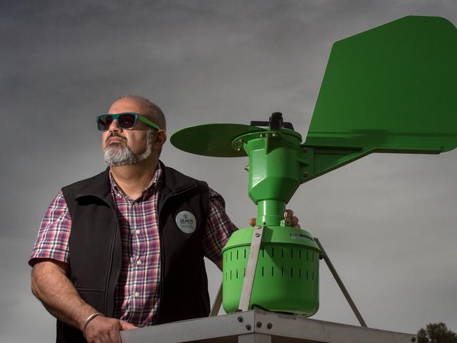 Deakin University thunderstorm asthma expert Professor Cenk Suphioglu monitors pollen using the Burkard Volumetric Pollen Sampler. Picture Jay Town.