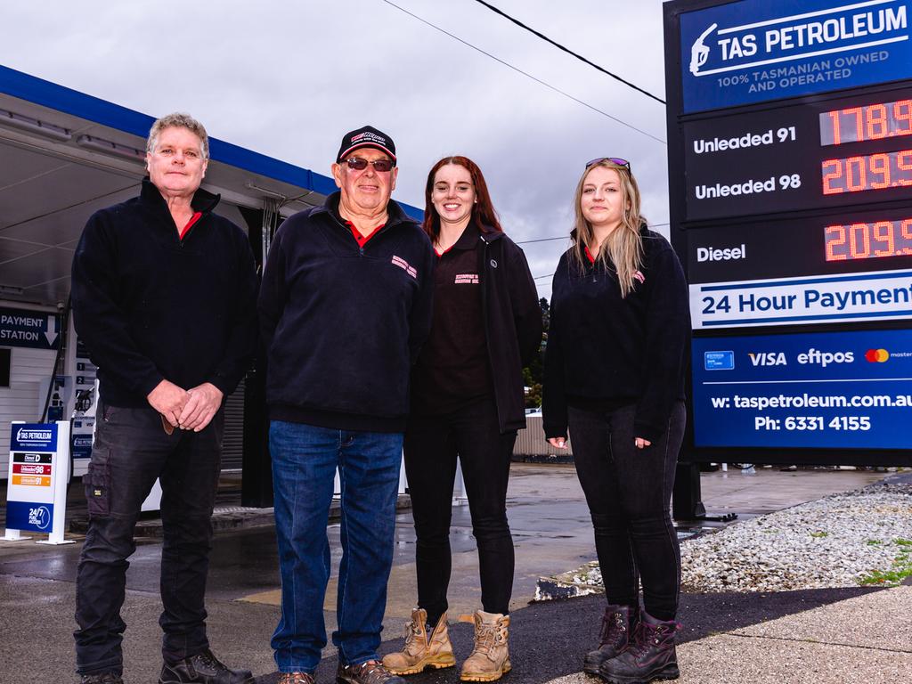 Peter Rimon (centre) with son-in-law, Peter Triffett and granddaughters Hayley Triffett and Demi Crook at the Kingston Beach Service Station, which Peter ran for 25 years. Picture: Linda Higginson