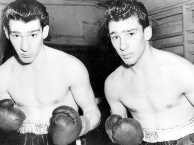 A young Ronnie (left) and Reggie Kray (right) in an undated photo during their amateur boxing days. Picture: File