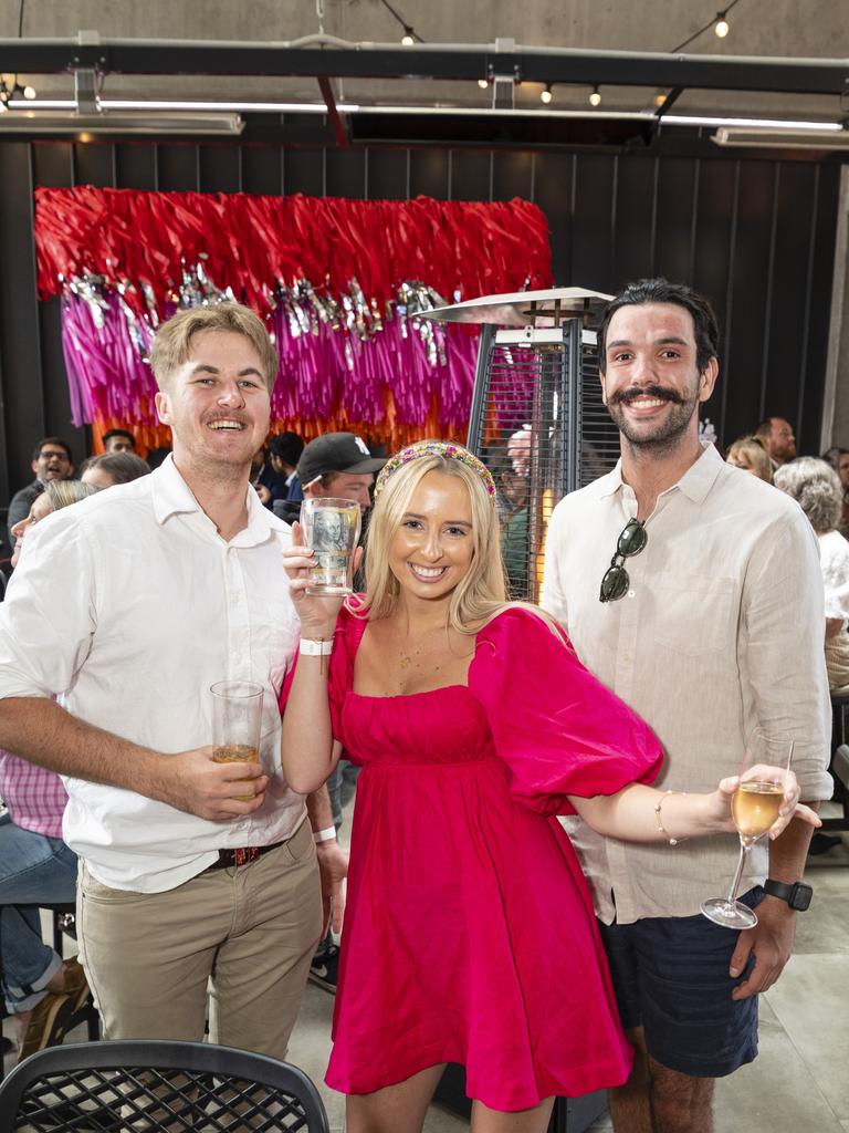 At the Melbourne Cup party are (from left) Riley Wockner, Holly Walker and Callum Hart at The Rock, Tuesday, November 1, 2022. Picture: Kevin Farmer