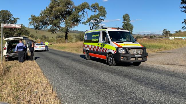 Paramedics treated the two men before one was flown to hospital and the other transported by ambulance. Picture: Peter Lorimer 