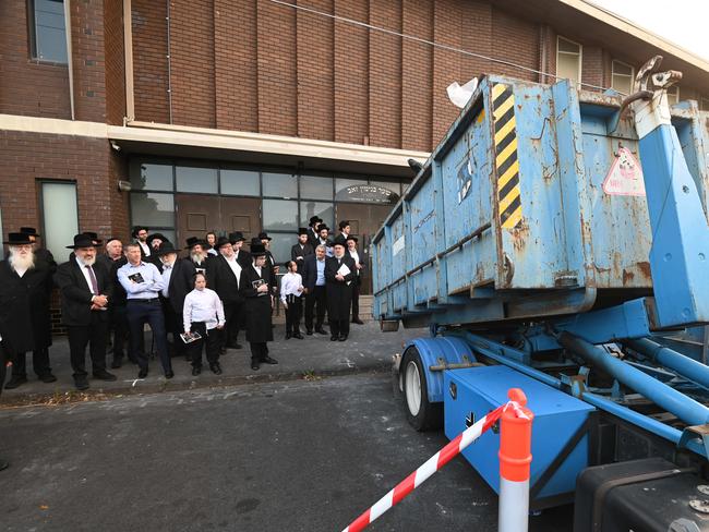 The holy books were placed in a skip. Picture: Tony Gough