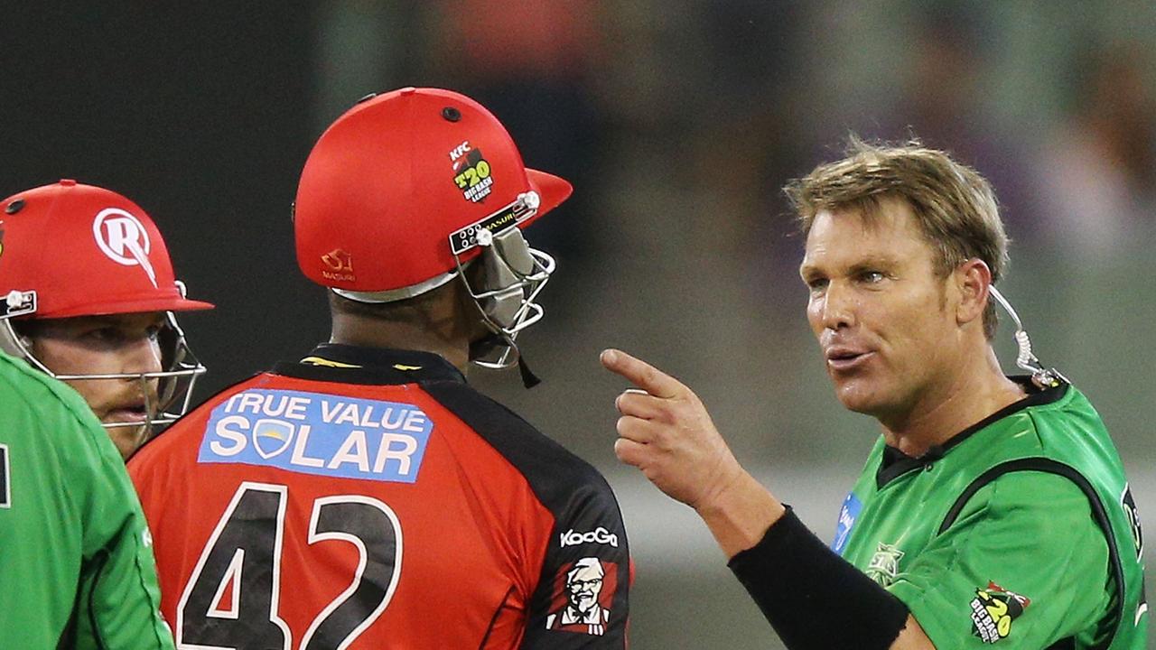 Shane Warne clashes with West Indian Marlon Samuels during a BBL derby.