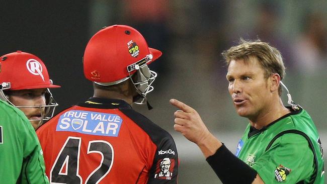 Shane Warne clashes with West Indian Marlon Samuels during a BBL derby.