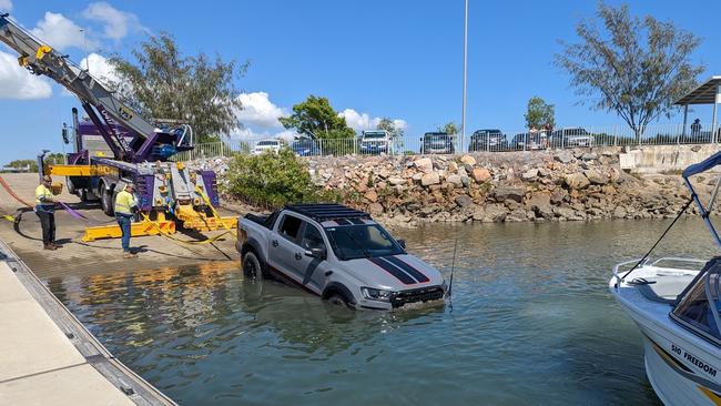 A stolen car being pulled out of the Ross River, near the South Townsville boat ramp. Picture: Supplied