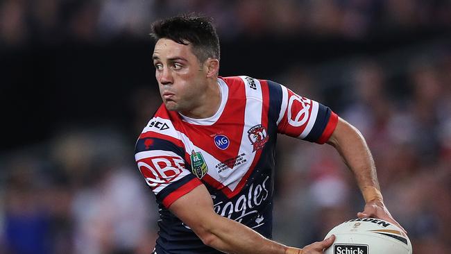 Roosters Cooper Cronk passes during the 2018 NRL Grand Final between the Sydney Roosters and Melbourne Storm at ANZ Stadium, Sydney. Picture: Brett Costello