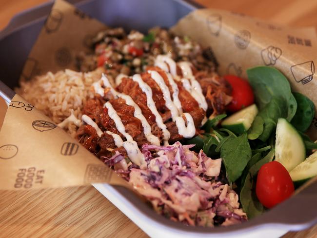 The protein and salad box containing chipotle bbq pulled pork, slaw, lebanese lentils and brown rice tossed in butter and garlic. Picture: Toby Zerna