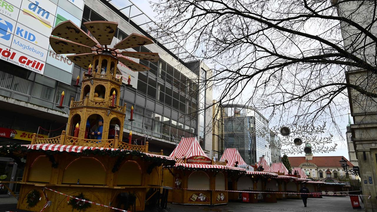 The site of a car-ramming attack on a Christmas market is pictured in Magdeburg, eastern Germany, on December 22, 2024. The death toll in the attack on December 20, rose to 5 on December 21, 2024, with over 200 injured, according to the head of the regional government, Reiner Haseloff. (Photo by John MACDOUGALL / AFP)