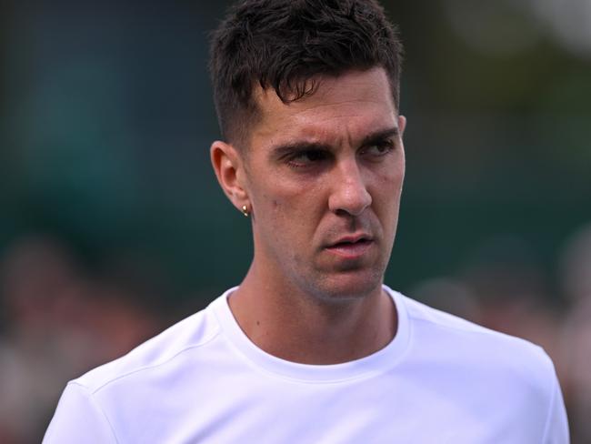 LONDON, ENGLAND - JULY 04: Thanasi Kokkinakis of Australia looks on as he plays against Lucas Pouille of France in his Gentlemen's Singles second round match during day four of The Championships Wimbledon 2024 at All England Lawn Tennis and Croquet Club on July 04, 2024 in London, England. (Photo by Mike Hewitt/Getty Images)
