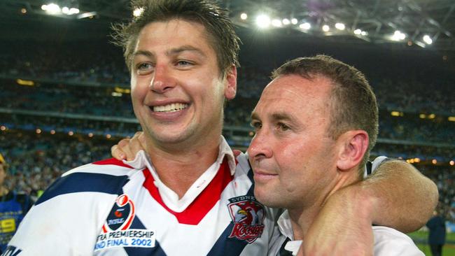 Luke Ricketson hugs his coach Ricky Stuart after the win 20 years ago.