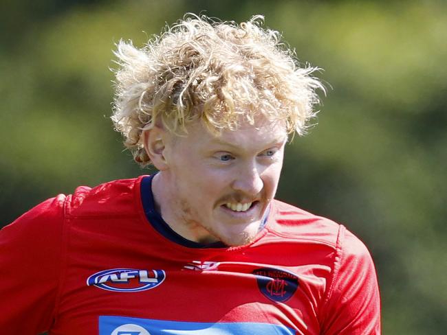 NCA. MELBOURNE, AUSTRALIA. 25th March, 2025 . AFL. Melbourne training at Gosche Paddock. Clayton Oliver of the Demons during soccer warm up at todays light training session at Goschs Paddock . Picture: Michael Klein