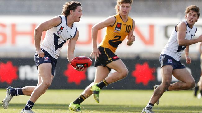 Mitch Szybkowski of Vic Country with the ball. Photo by Dylan Burns/AFL Photos via Getty Images