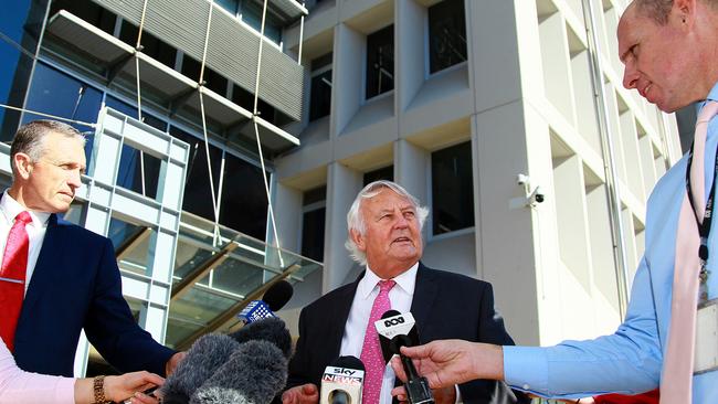 Counsel assisting the Coroner Ken Fleming speaks to the media during the lunch break for the Dreamworld Thunder River Rapids Ride Inquest at Southport Court in the Gold Coast, Friday, June 29, 2018. (AAP Image/David Clark)