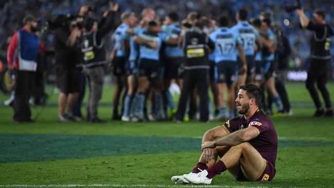 Queensland haflback Ben Hunt cuts a forlorn figure after the game at ANZ Stadium. Picture: AAP