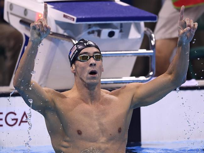 USA's Michael Phelps celebrates after winning the Men's 200m Butterfly.