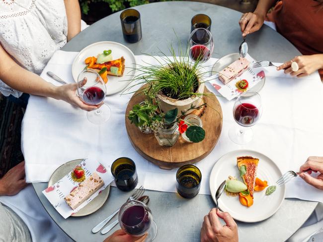 Food Trends Smashing Dishes. Diners at  Chiswick Garden restaurant in Woollahra. Picture: Steven Woodburn